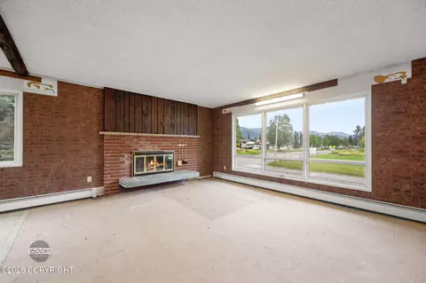Living - 7007 E 16th Ave, Anchorage, AK 99504 photo 7 of 11