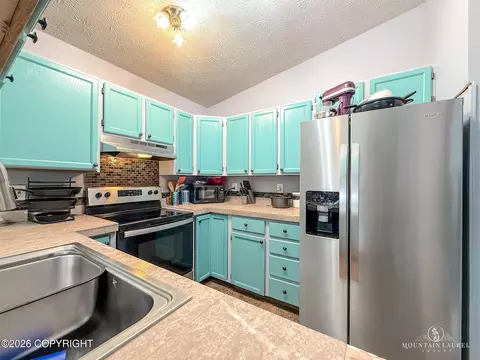 Kitchen - 8020 Pinebrook Cir, Anchorage, AK 99507 photo 3 of 3