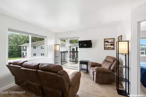 Living - 111 E Potter Dr # 5, Anchorage, AK 99518 photo 1 of 4