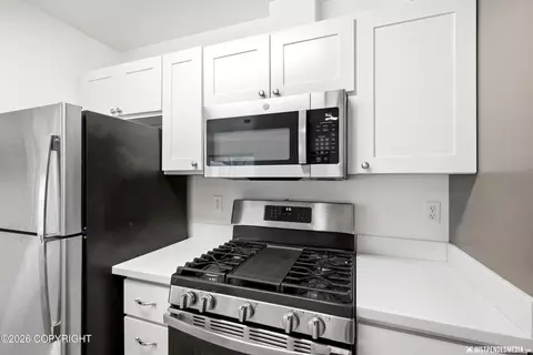 Kitchen - 111 E Potter Dr # 5, Anchorage, AK 99518 photo 4 of 5