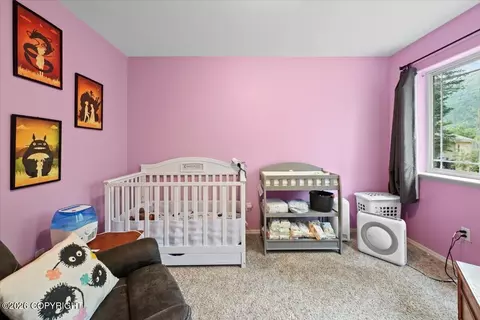 Bedroom - 8700 Inyo Cir, Eagle River, AK 99577 photo 10 of 14