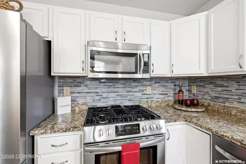 Kitchen - 19652 Highland Ridge Dr, Eagle River, AK 99577 photo 5 of 6