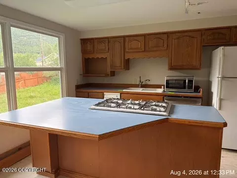 Kitchen - 19413 First St, Eagle River, AK 99577 photo 3 of 4