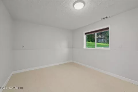Bedroom - 22808 Mcmanus Dr, Chugiak, AK 99567 photo 7 of 10