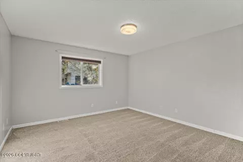 Bedroom - 22808 Mcmanus Dr, Chugiak, AK 99567 photo 9 of 10