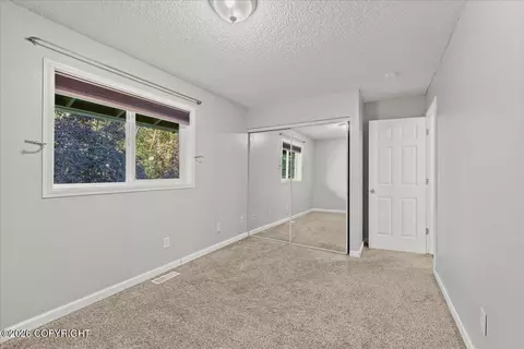 Bedroom - 22808 Mcmanus Dr, Chugiak, AK 99567 photo 2 of 10