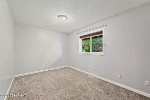 Bedroom - 22808 Mcmanus Dr, Chugiak, AK 99567 photo 1 of 10