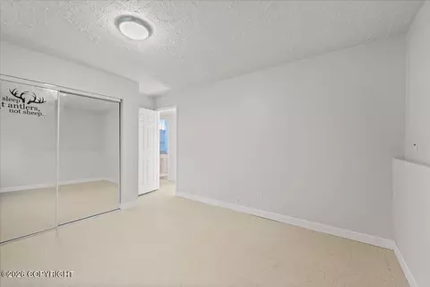 Bedroom - 22808 Mcmanus Dr, Chugiak, AK 99567 photo 8 of 10
