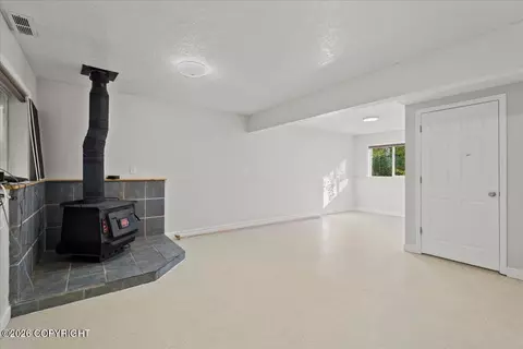 Living - 22808 Mcmanus Dr, Chugiak, AK 99567 photo 5 of 6