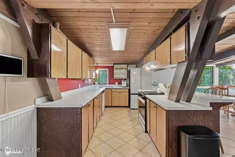Kitchen - 13817 Malaspina St, Eagle River, AK 99577 photo 3 of 4