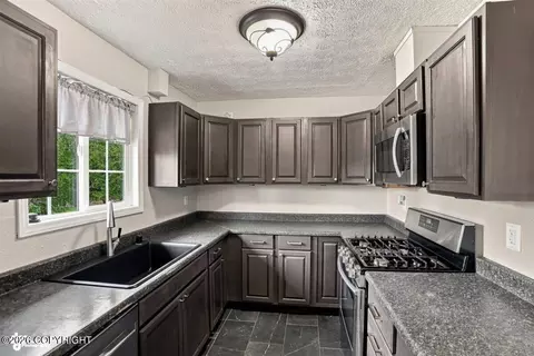 Kitchen - 10812 Goodpaster Cir, Eagle River, AK 99577 photo 3 of 3