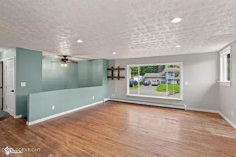 Living - 10812 Goodpaster Cir, Eagle River, AK 99577 photo 2 of 5
