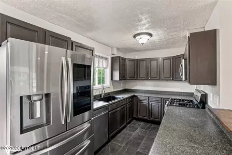 Kitchen - 10812 Goodpaster Cir, Eagle River, AK 99577 photo 2 of 3