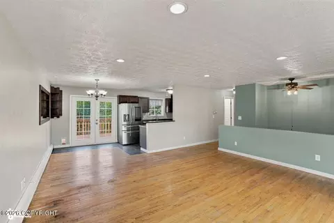 Living - 10812 Goodpaster Cir, Eagle River, AK 99577 photo 3 of 5