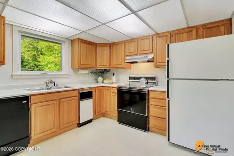 Kitchen - 3386 Checkmate Dr, Anchorage, AK 99508 photo 4 of 6