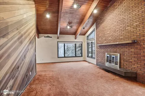 Living - 6770 Round Tree Dr, Anchorage, AK 99507 photo 1 of 4