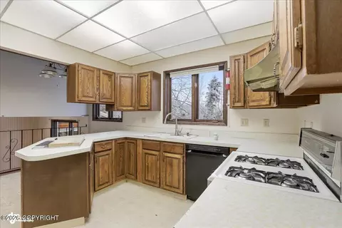 Kitchen - 6770 Round Tree Dr, Anchorage, AK 99507 photo 1 of 2