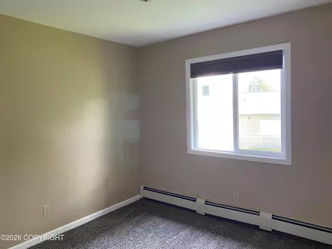 Bedroom - 402 E 11th Ave, Anchorage, AK 99501 photo 2 of 3