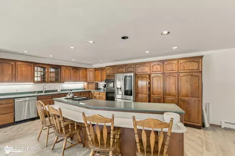 Kitchen - 10190 Our Rd, Anchorage, AK 99507 photo 2 of 7