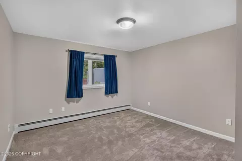 Bedroom - 4741 Mars Dr, Anchorage, AK 99507 photo 8 of 9