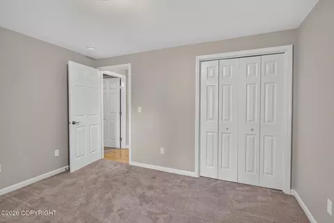 Bedroom - 4741 Mars Dr, Anchorage, AK 99507 photo 7 of 9