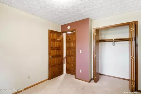 Bedroom - 7300 Clairborne Dr, Anchorage, AK 99502 photo 10 of 13