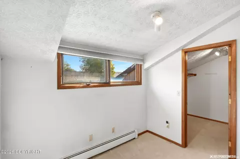 Bedroom - 7300 Clairborne Dr, Anchorage, AK 99502 photo 4 of 13