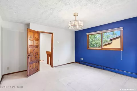 Bedroom - 7300 Clairborne Dr, Anchorage, AK 99502 photo 3 of 13