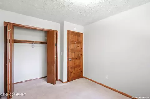 Bedroom - 7300 Clairborne Dr, Anchorage, AK 99502 photo 12 of 13