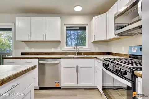 Kitchen - 701 E 54th Ave, Anchorage, AK 99518 photo 2 of 4