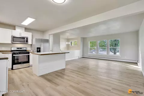 Living - 701 E 54th Ave, Anchorage, AK 99518 photo 5 of 9