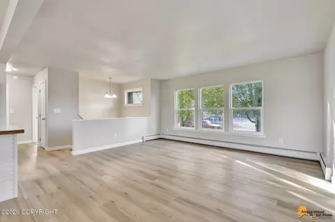 Living - 701 E 54th Ave, Anchorage, AK 99518 photo 3 of 9