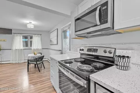 Kitchen - 11429 Heritage Ct # 1, Eagle River, AK 99577 photo 4 of 4
