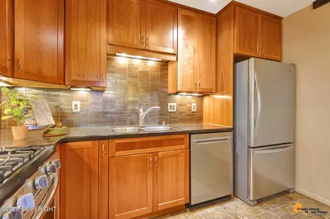 Kitchen - 7898 Highlander Dr, Anchorage, AK 99518 photo 2 of 3