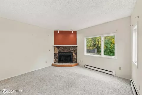 Living - 1930 E 72nd Ave, Anchorage, AK 99507 photo 2 of 8