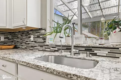 Kitchen - 21930 Sheltering Spruce Loop, Chugiak, AK 99567 photo 5 of 6