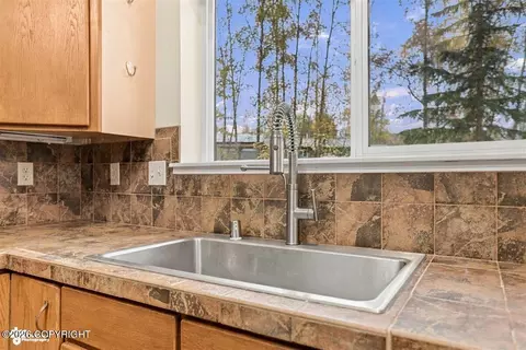 Kitchen - 21500 River Park Dr, Eagle River, AK 99577 photo 2 of 3