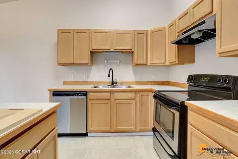 Kitchen - 12308 Vista Ridge Loop # 84, Eagle River, AK 99577 photo 6 of 6