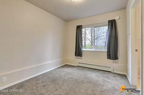 Bedroom - 12308 Vista Ridge Loop # 84, Eagle River, AK 99577 photo 9 of 11
