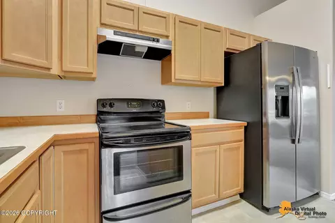 Kitchen - 12308 Vista Ridge Loop # 84, Eagle River, AK 99577 photo 4 of 6