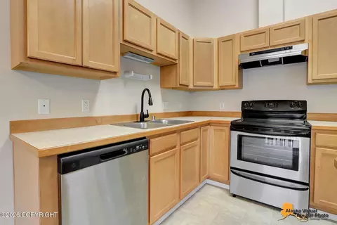 Kitchen - 12308 Vista Ridge Loop # 84, Eagle River, AK 99577 photo 3 of 6