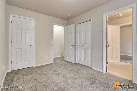 Bedroom - 12308 Vista Ridge Loop # 84, Eagle River, AK 99577 photo 7 of 11