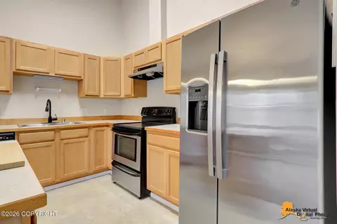 Kitchen - 12308 Vista Ridge Loop # 84, Eagle River, AK 99577 photo 5 of 6