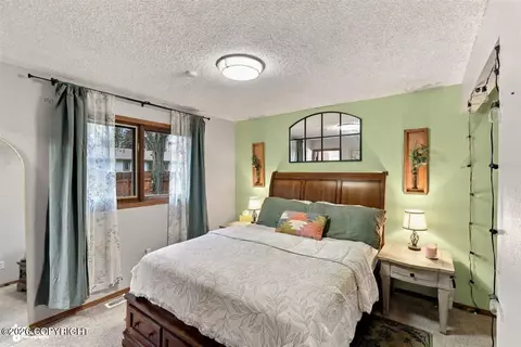 Bedroom - 11447 Targhee Loop, Eagle River, AK 99577 photo 2 of 6