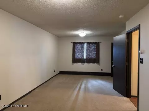 Living - 341 Fireoved Dr, Anchorage, AK 99508 photo 2 of 3