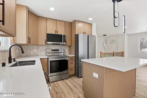 Kitchen - 420 E 46th Pl, Anchorage, AK 99503 photo 2 of 3