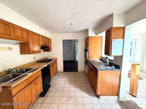 Kitchen - 21220 Monron St, Chugiak, AK 99567 photo 2 of 2