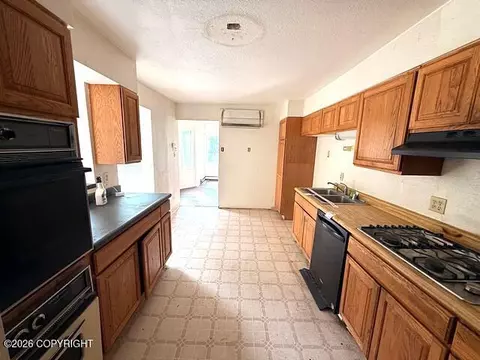 Kitchen - 21220 Monron St, Chugiak, AK 99567 photo 1 of 2