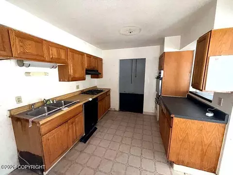 Kitchen - 21220 Monron St, Chugiak, AK 99567 photo 1 of 2
