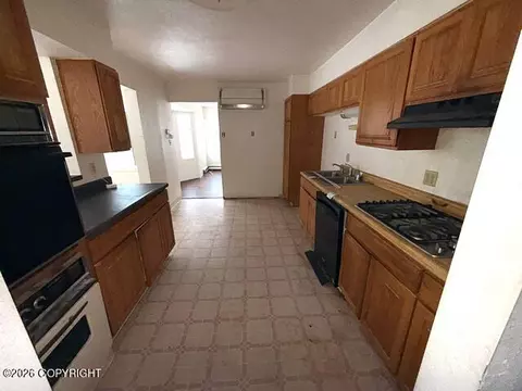 Kitchen - 21220 Monron St, Chugiak, AK 99567 photo 2 of 2